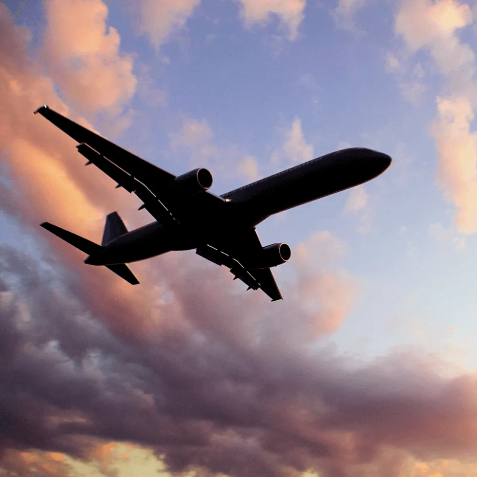 Airplane Soaring In The Sky